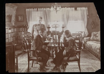 Francis Wilson and His Daughter Playing Chess in the Dining Room of Their Residence in New Rochelle, New York by Byron Company
